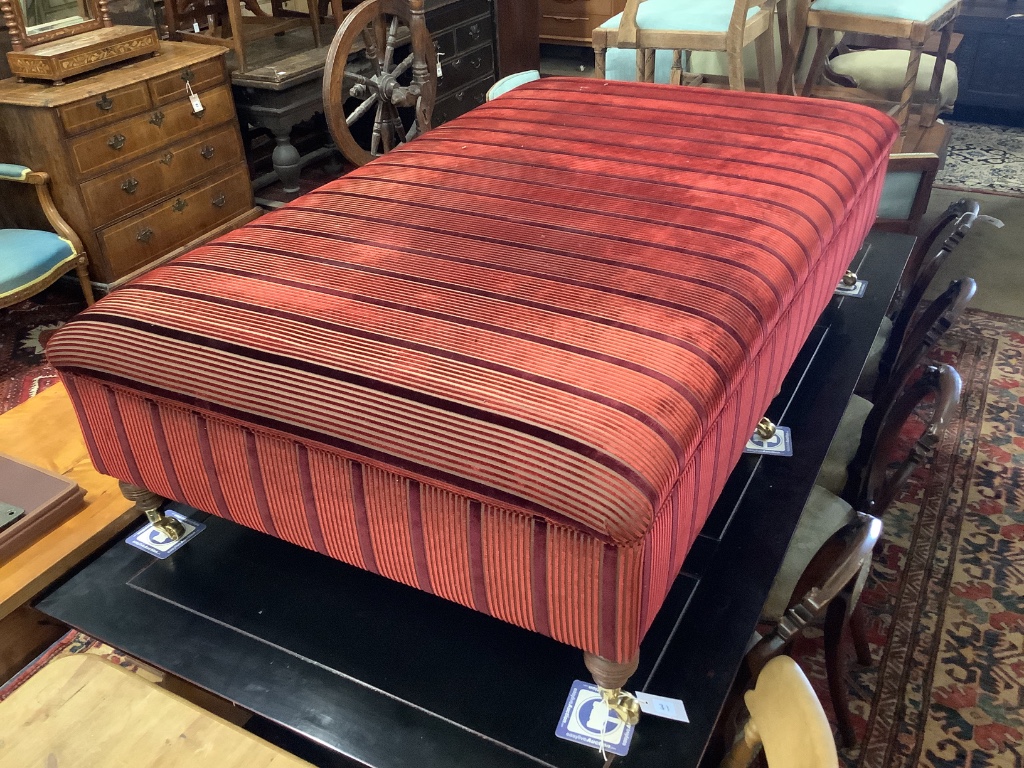 A large Victorian style rectangular upholstered footstool on six turned feet, length 156cm, depth 90cm, height 43cm